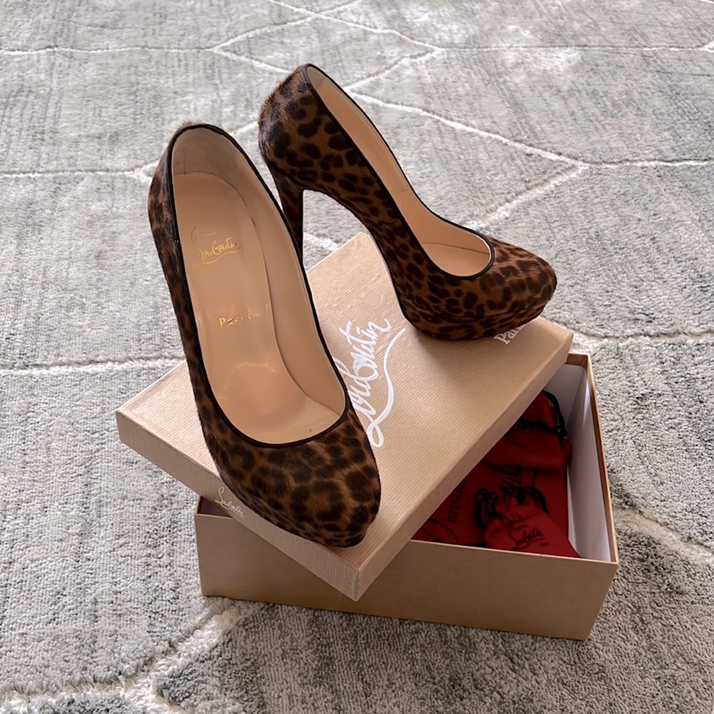 Louboutin red bottom pumps. Leopard pony size 41